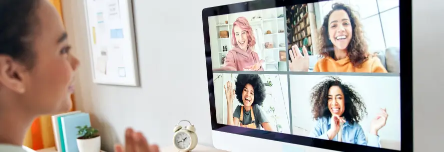 Teen girl on video call with four female friends.